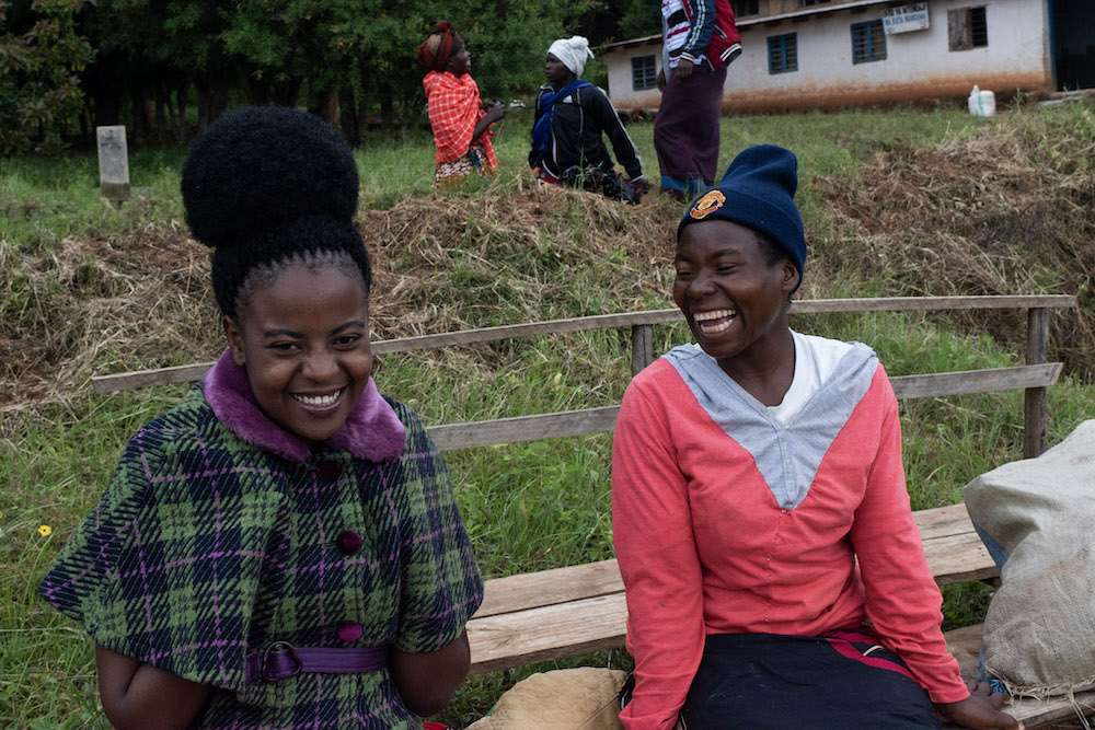 Villagers smiling and laughing